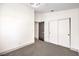 This bedroom features neutral carpet, closet, and door at 2133 Linden Tree St, Las Vegas, NV 89156