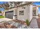 Beautiful home showcasing a side view with well-kept landscaping, leading to the front entryway at 2133 Linden Tree St, Las Vegas, NV 89156