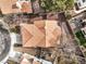 Detailed overhead view of a home displaying terracotta roof, cozy backyard, and outdoor patio space at 2153 Hookcross Cir, Henderson, NV 89074