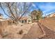 Expansive backyard featuring drought tolerant landscaping and a secure fenced perimeter at 2153 Hookcross Cir, Henderson, NV 89074