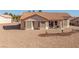 Exterior elevation featuring a low-maintenance backyard and covered back patio at 2401 Rockford St, Las Vegas, NV 89134