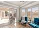 Cozy breakfast nook with large windows offering a view of the outdoor patio area at 2401 Rockford St, Las Vegas, NV 89134