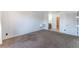 Spacious carpeted bedroom with ensuite bathroom and floating shelves for storage at 2451 N Rainbow Blvd # 2139, Las Vegas, NV 89108