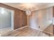 Dining area featuring hardwood floors, a modern light fixture and fresh paint at 2451 N Rainbow Blvd # 2139, Las Vegas, NV 89108