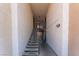 Condo stairwell with a secure access, natural light, and a neutral color palette at 2451 N Rainbow Blvd # 2139, Las Vegas, NV 89108