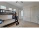 Bright bedroom featuring a bunk bed, neutral walls, carpet, and ample closet space at 3 Chenal Pass, Henderson, NV 89052