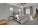 Cozy bedroom featuring neutral tones, comfortable bedding, and ample natural light at 3 Chenal Pass, Henderson, NV 89052