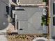 Overhead view of the house and neighborhood, highlighting the roof, backyard, and desert landscaping at 3025 Merlesco Ave, Henderson, NV 89044