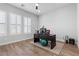 Home office with wood floors and large windows with plantation shutters for natural light at 3025 Merlesco Ave, Henderson, NV 89044