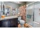 Bathroom features a glass-enclosed shower and vanity at 306 Treehouse Ct, Henderson, NV 89012