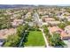 Aerial view of a large grassy lot available in a neighborhood of single-Gathering homes at 306 Treehouse Ct, Henderson, NV 89012