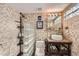 Bathroom featuring tiled walls, modern fixtures, and ample counter space at 3212 Sundown Dr, Las Vegas, NV 89169