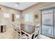 Dining area with views to outdoor patio and featuring a dining table with seating for six at 387 Layla Bay St, Henderson, NV 89014