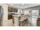 Beautiful kitchen with stainless steel appliances, granite countertops, and a kitchen island with barstool seating at 387 Layla Bay St, Henderson, NV 89014