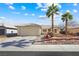 Charming single-story home with desert landscaping and a two-car garage at 3910 Cheryl Clay Way, North Las Vegas, NV 89032