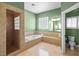 Bright bathroom with tub, shower, and toilet at 4200 Topsider St, Las Vegas, NV 89129