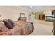 Spacious main bedroom featuring neutral colors and a fireplace at 4200 Topsider St, Las Vegas, NV 89129