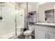 Clean bathroom featuring a tiled walk-in shower and modern vanity, and a linen closet at 4220 Porticella Ave, North Las Vegas, NV 89084