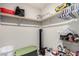 Walk-in closet with shelving and a fan at 4220 Porticella Ave, North Las Vegas, NV 89084