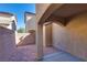 A private backyard is enclosed by a stone wall and features a covered patio at 4626 Lime Straight Dr, Las Vegas, NV 89115