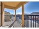 A balcony shows black iron railings, supporting posts, and neighborhood views at 4626 Lime Straight Dr, Las Vegas, NV 89115