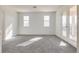 Spacious bedroom featuring plush carpeting and a private balcony entrance at 4626 Lime Straight Dr, Las Vegas, NV 89115