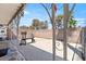 View of the back patio with weight-lifting equipment and a concrete block wall at 4716 Mountain Valley Rd, Las Vegas, NV 89121