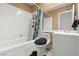 Clean bathroom featuring a shower-tub combination, toilet, and vanity with a clean, traditional style at 4716 Mountain Valley Rd, Las Vegas, NV 89121