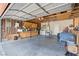 Spacious two car garage with exposed framing, work bench, laundry and storage space at 4716 Mountain Valley Rd, Las Vegas, NV 89121