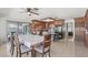 Bright kitchen with views to the pool, offering warm wood cabinetry and modern appliances at 4716 Mountain Valley Rd, Las Vegas, NV 89121