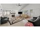 Bright living room with a ceiling fan, fireplace, tile floors and lots of natural light at 4716 Mountain Valley Rd, Las Vegas, NV 89121