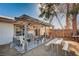 Outdoor space offers a covered patio area with furniture, set in a gravel-covered backyard at 4815 Palacio Ct, Las Vegas, NV 89122