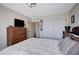 Bedroom featuring a dresser and a closet and access to a hallway at 4815 Palacio Ct, Las Vegas, NV 89122