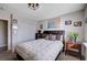 Bedroom featuring a closet, a window with natural light, and a decorative plant at 4815 Palacio Ct, Las Vegas, NV 89122