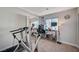 Bright exercise room with mirrored closet doors and views of the exterior at 4815 Palacio Ct, Las Vegas, NV 89122