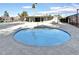 Community hot tub with surrounding patio area and access to the pool house with picnic tables at 4815 Palacio Ct, Las Vegas, NV 89122