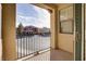 Charming balcony view overlooking the neighborhood showcasing blue skies and sunlight at 500 Via Stretto Ave, Henderson, NV 89011