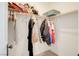 Organized closet space with hanging clothes and overhead storage at 500 Via Stretto Ave, Henderson, NV 89011