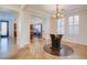 Formal dining room offers an open floor plan with stained concrete floors at 500 Via Stretto Ave, Henderson, NV 89011