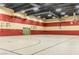 Spacious gymnasium equipped with basketball hoops, perfect for active residents at 500 Via Stretto Ave, Henderson, NV 89011