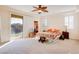 Sunny main bedroom with private balcony and dual windows at 500 Via Stretto Ave, Henderson, NV 89011