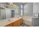 Double vanity bathroom with soaking tub and separate shower at 5205 Mantua Ct, Las Vegas, NV 89130