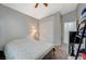 Well-lit bedroom with a queen bed and closet at 5205 Mantua Ct, Las Vegas, NV 89130