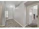 Light and airy entryway with tile flooring and neutral walls at 5205 Mantua Ct, Las Vegas, NV 89130