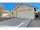 House exterior showcasing a garage and desert landscaping at 5205 Mantua Ct, Las Vegas, NV 89130