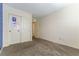 Bedroom with double closets, carpeted floors, and neutral colors at 546 Foothill Cove Ln, Henderson, NV 89002