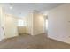 Upstairs hallway features carpeted floors and two linen closets at 546 Foothill Cove Ln, Henderson, NV 89002