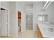 Bathroom with a double vanity and bright lighting at 6086 Shadow Oak Dr, North Las Vegas, NV 89031