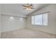 Bedroom with neutral carpet and a ceiling fan at 6086 Shadow Oak Dr, North Las Vegas, NV 89031