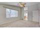 Bedroom featuring a ceiling fan and natural lighting at 6086 Shadow Oak Dr, North Las Vegas, NV 89031